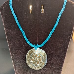 Turquoise Beaded Necklace with Floral Pendant